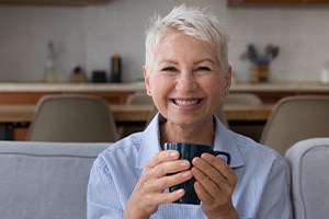 Woman smiling on a couch